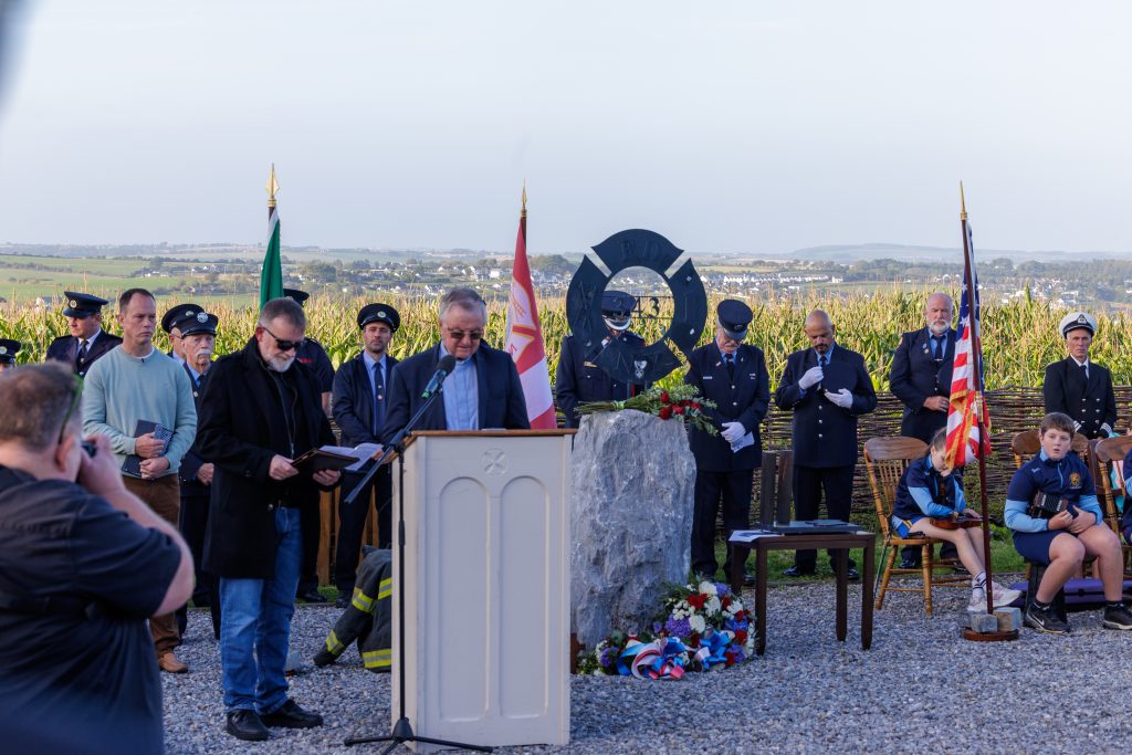Fr Robert Young and a second cleric bless the wreaths.